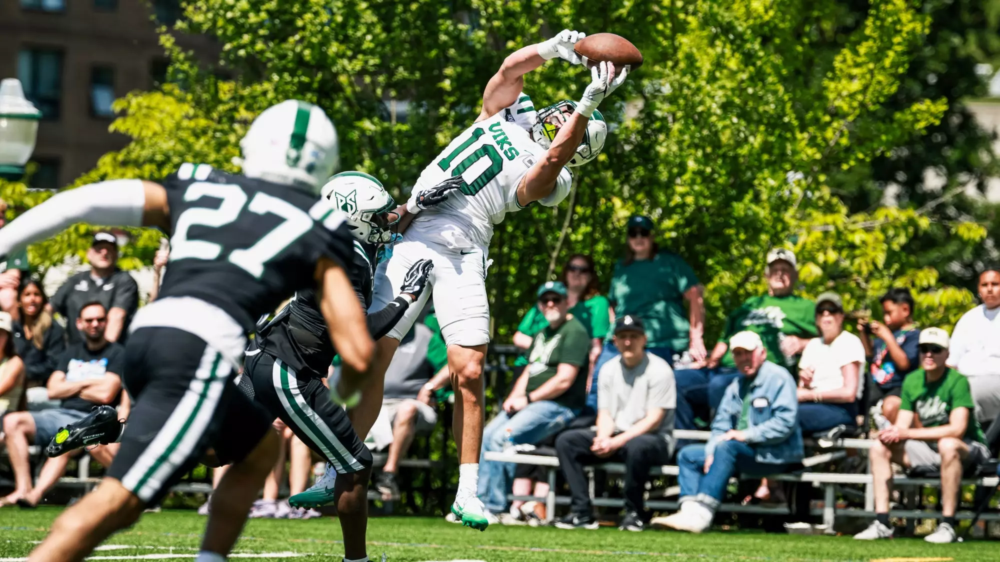 Tight end Tanner Beaman hauls in a touchdown reception in Saturday's Spring Game