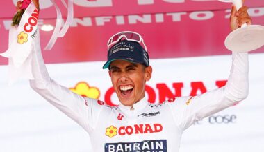 Bahrain - Victorious Portuguese rider Afonso Eulalio celebrates on the podium with the best young rider's white jersey after the 20th stage of the Giro d'Italia 2026 - Tour of Italy cycling race between Gemona del Friuli and Piancavallo, Italy, on May 30, 2026. (Photo by Luca Bettini / AFP)