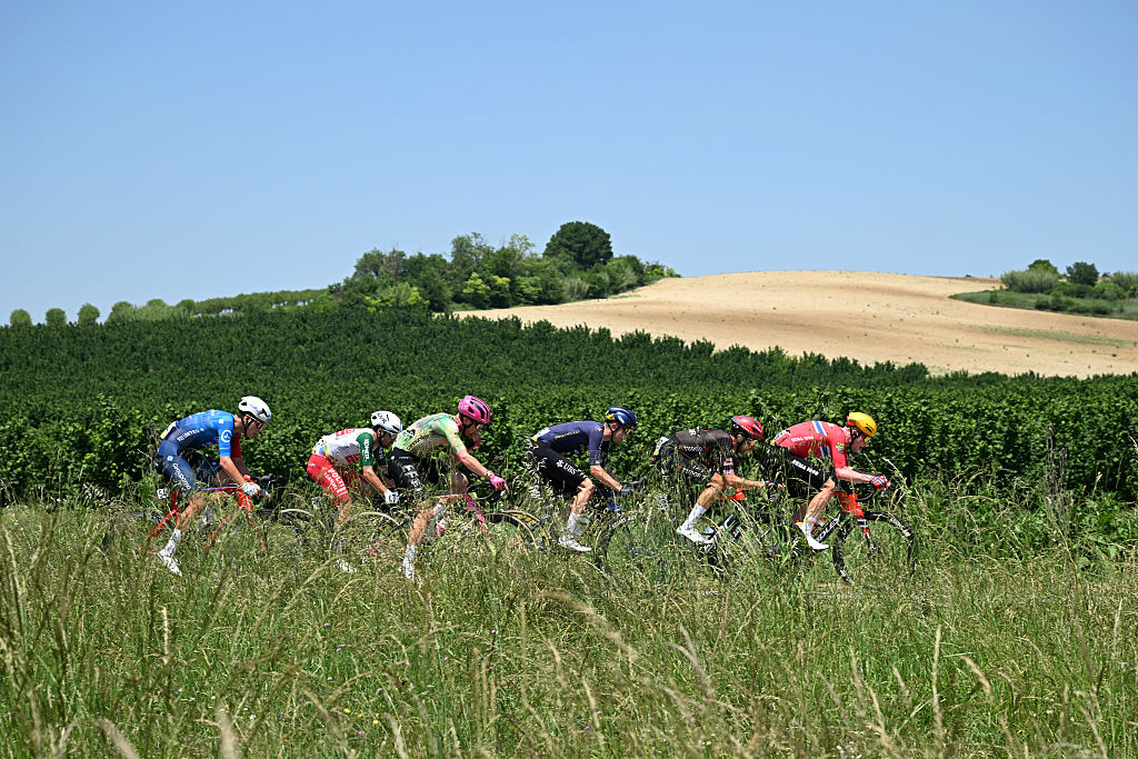 VERBANIA, ITALY - MAY 22: A general view of Johan Jacobs of Switzerland and Team Groupama - FDJ United, Diego Pablo Sevilla of Spain and Team Polti VisitMalta, Michael Valgren of Denmark and Team EF Education - EasyPost, Mark Donovan of Great Britain and Team Pinarello Q36.5 Pro Cycling, Larry Warbasse of United States and Team Tudor Pro Cycling and Andreas Leknessund of Norway and Team Uno-X Mobility compete in the breakaway during the 109th Giro d&amp;apos;Italia 2026, Stage 13 a 189km stage from Alessandria to Verbania / #UCIWT / on May 22, 2026 in Verbania, Italy. (Photo by Dario Belingheri/Getty Images)