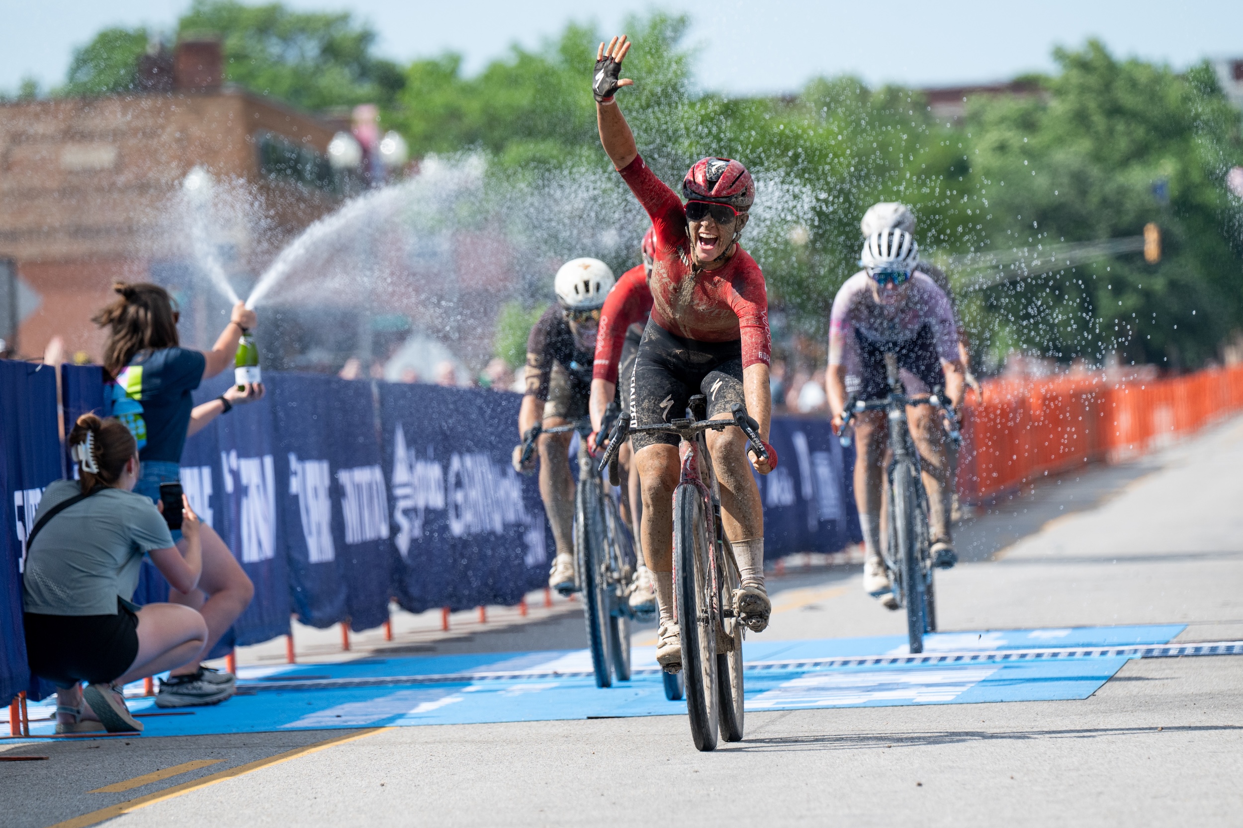Sofia Gomez Villafa&ntilde;e punches the air with victory at 2026 Unbound Gravel 200 in five-rider sprint