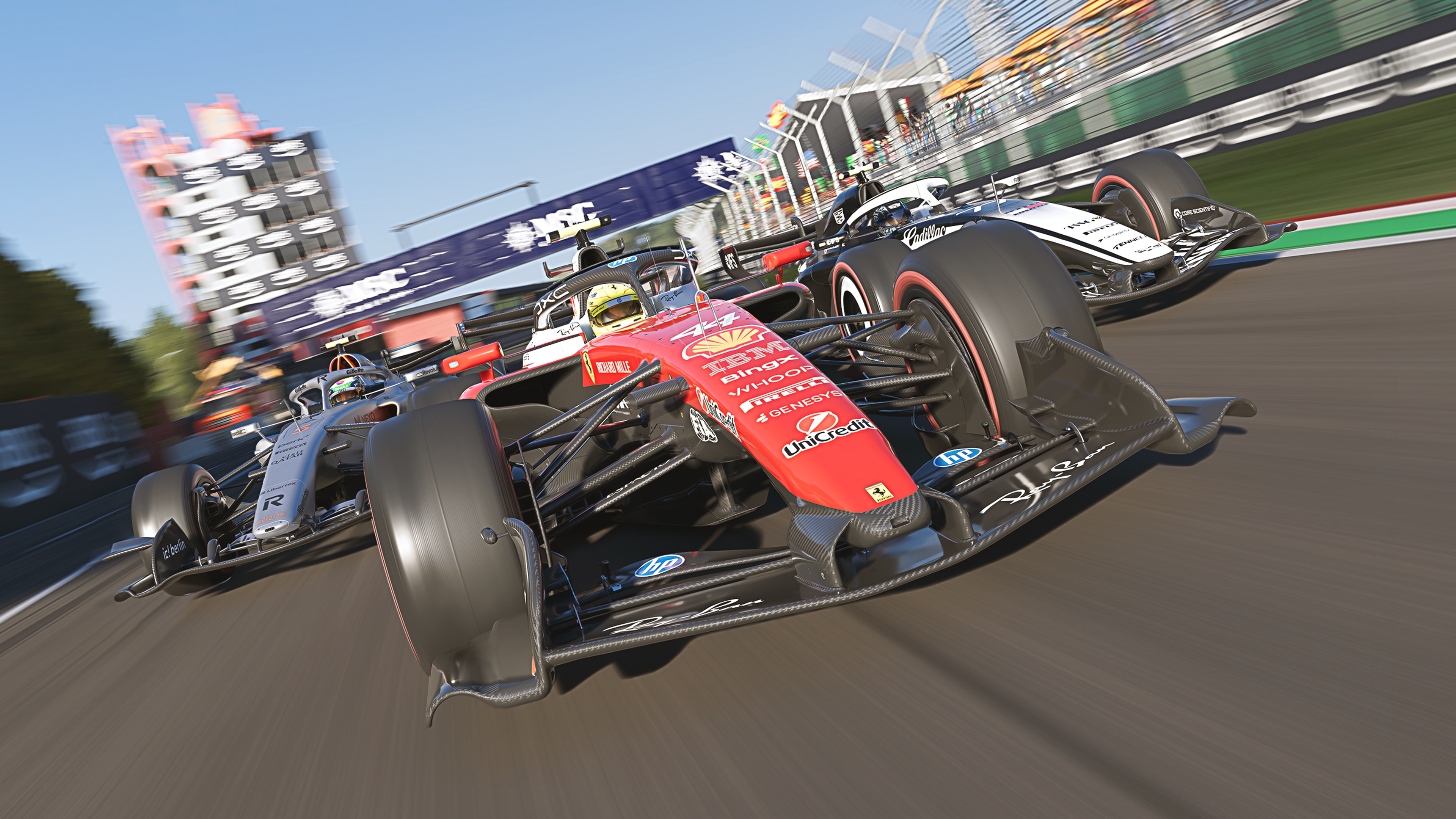 Ferrari, Audi and Cadillac F1 cars racing