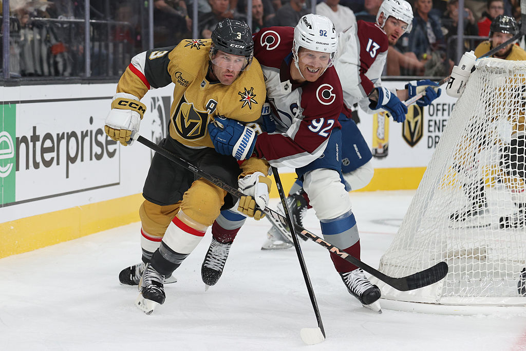LAS VEGAS, NEVADA - OCTOBER 01: Brayden McNabb #3 of the Vegas Golden Knights battles against Gabriel Landeskog #92 of the Colorado Avalanche during the third period at T-Mobile Arena on October 01, 2025 in Las Vegas, Nevada. (Photo by Zak Krill/NHLI via Getty Images)
