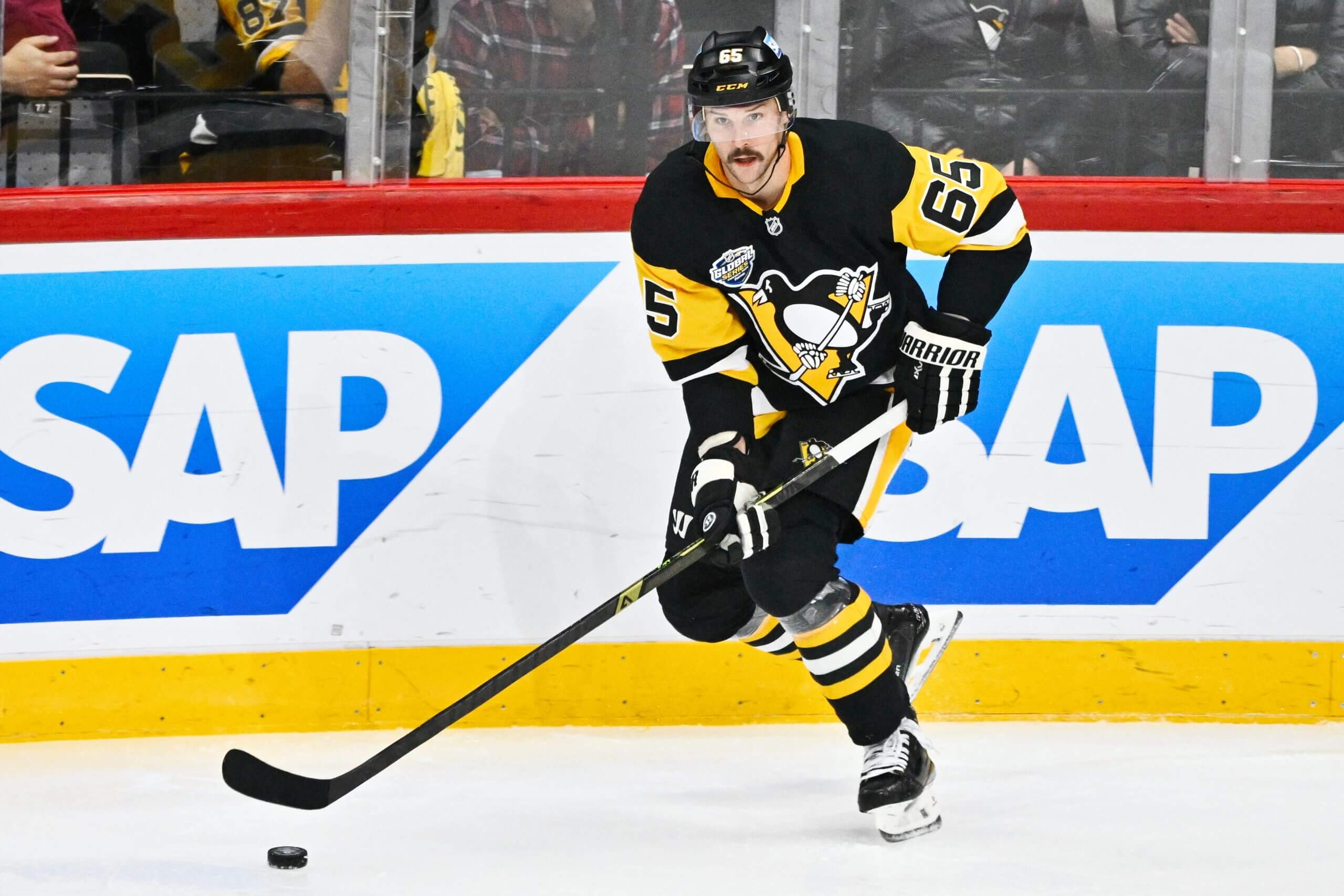Erik Karlsson skates with the puck. 