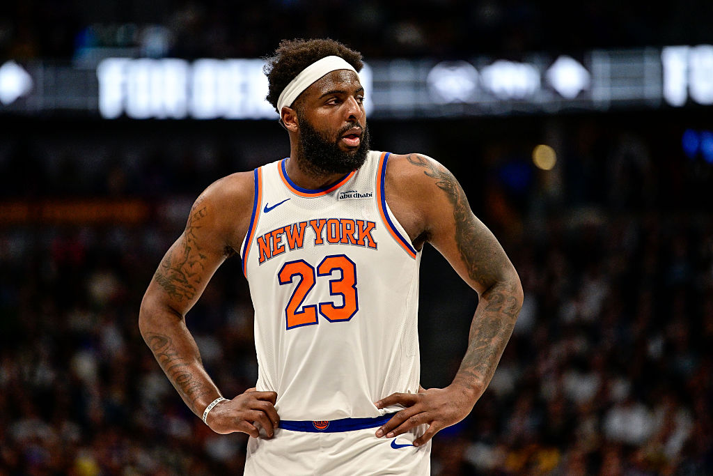DENVER, COLORADO - MARCH 6: Mitchell Robinson #23 of the New York Knicks reacts to a play in the first half against the Denver Nuggets at Ball Arena on March 6, 2026 in Denver, Colorado. NOTE TO USER: User expressly acknowledges and agrees that, by downloading and or using this photograph, User is consenting to the terms and conditions of the Getty Images License Agreement. (Photo by Dustin Bradford/Getty Images)