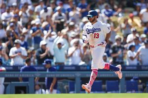 LOS ANGELES, CA - MAY 10: Max Muncy #13 of the Los Angeles Dodgers rounds the bases after hitting a two-run home run in the eighth inning during the game between the Atlanta Braves and the Los Angeles Dodgers at UNIQLO Field at Dodger Stadium on Sunday, May 10, 2026 in Los Angeles, California. (Photo by Jessie Alcheh/MLB Photos via Getty Images)