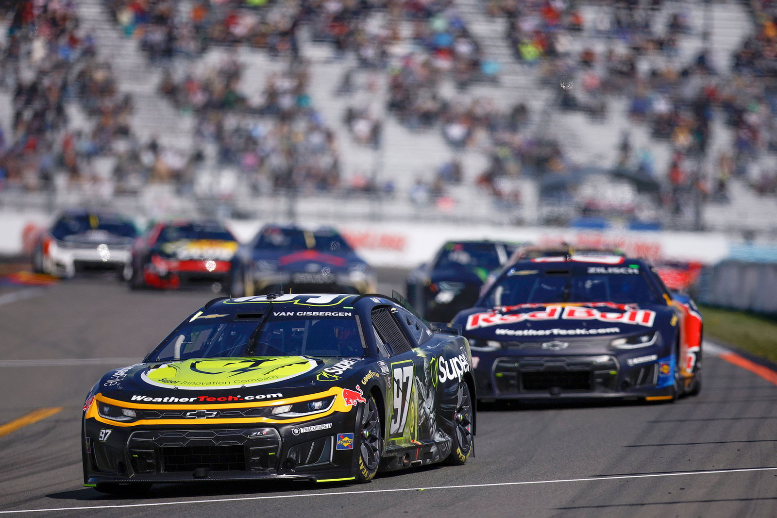 Connor Zilisch chases Shane van Gisbergen at Watkins Glen.