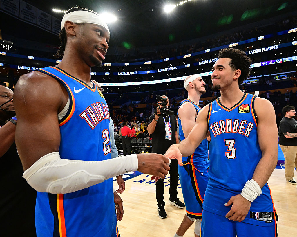 LOS ANGELES, CA - MAY 11: Shai Gilgeous-Alexander #2 and Jared McCain #3 of the Oklahoma City Thunder shake hands after the game against the Los Angeles Lakers during Round Two Game Four of the 2026 NBA Playoffs on May 11, 2026 at Crypto.Com Arena in Los Angeles, California. NOTE TO USER: User expressly acknowledges and agrees that, by downloading and/or using this Photograph, user is consenting to the terms and conditions of the Getty Images License Agreement. Mandatory Copyright Notice: Copyright 2026 NBAE (Photo by Adam Pantozzi/NBAE via Getty Images)