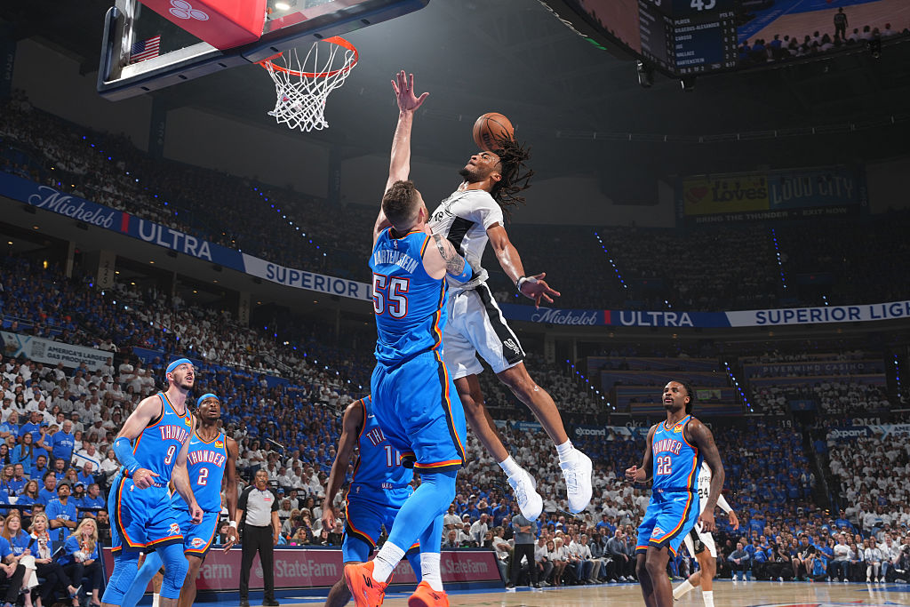 OKLAHOMA CITY, OK - MAY 20: Stephon Castle #5 of the San Antonio Spurs dunks the ball during the game against the Oklahoma City Thunder during Game Two of the NBA Western Conference Finals on May 20, 2026 at Paycom Center in Oklahoma City, Oklahoma. NOTE TO USER: User expressly acknowledges and agrees that, by downloading and or using this photograph, User is consenting to the terms and conditions of the Getty Images License Agreement. Mandatory Copyright Notice: Copyright 2026 NBAE (Photo by Jesse D. Garrabrant/NBAE via Getty Images)