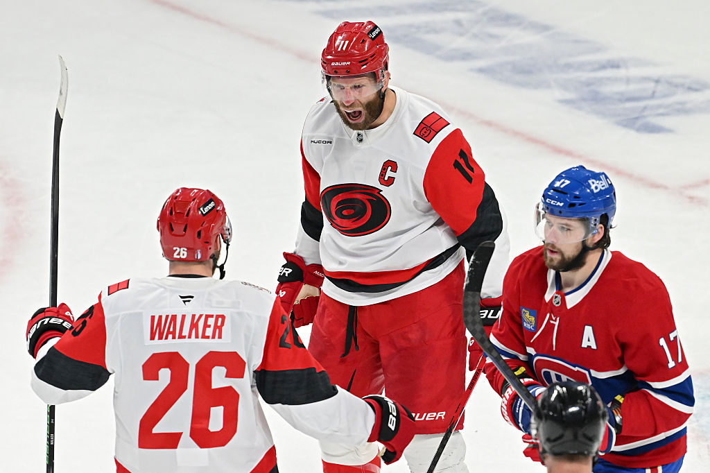 MONTREAL, CANADA - MAY 27: Jordan Staal #11 of the Carolina Hurricanes celebrates after scoring a goal against the Montreal Canadiens with Sean Walker #26 during the first period in Game Four of the Eastern Conference Final of the 2026 Stanley Cup Playoffs at Bell Centre on May 27, 2026 in Montreal, Quebec, Canada. (Photo by Minas Panagiotakis/Getty Images)