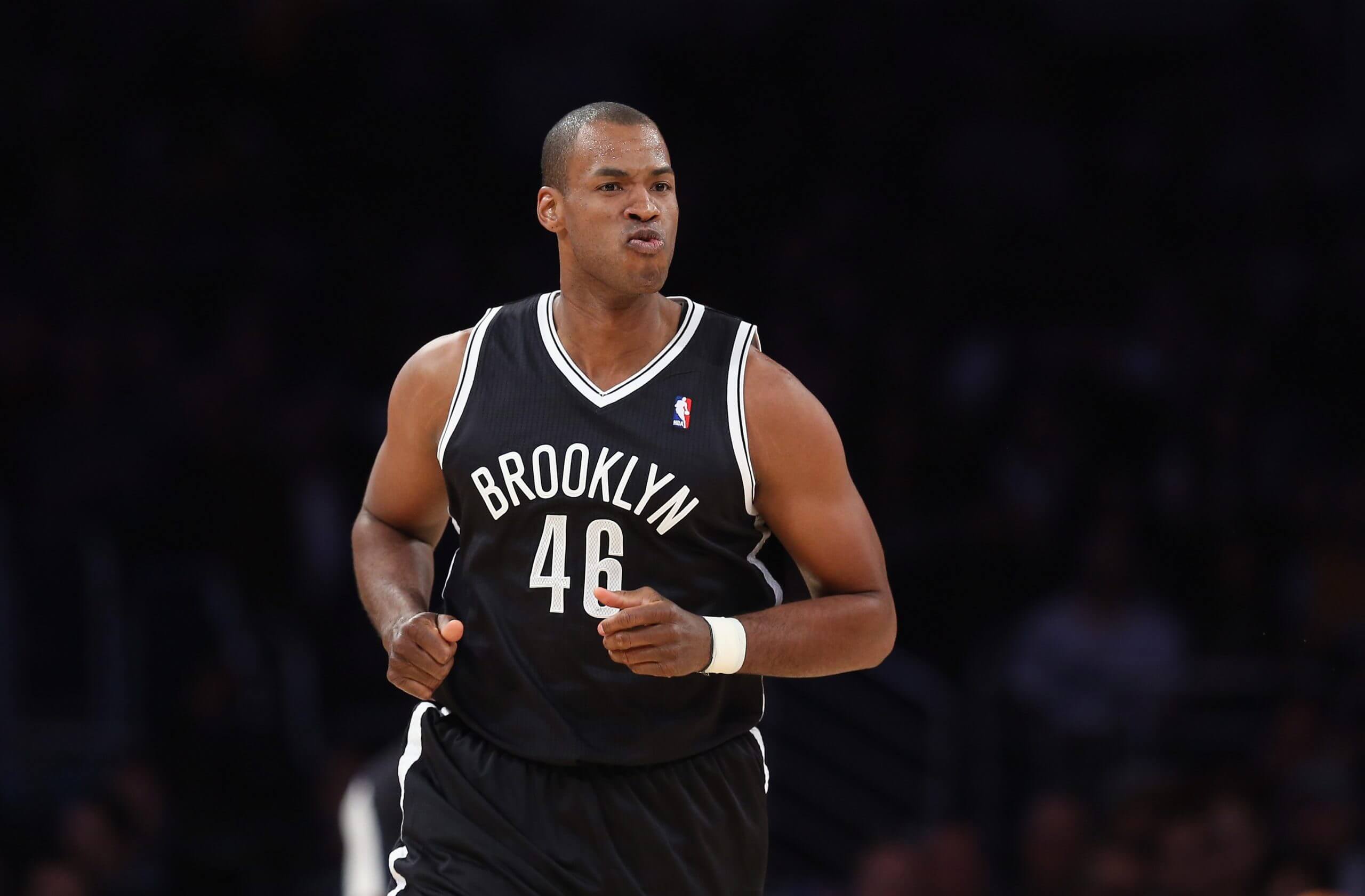 Jason Collins runs up the court during a game for the Brooklyn Nets