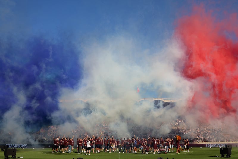 Bordeaux-Begles' players gather during celebrations at the Chaban-Delmas Stadium in Bordeaux after their Champions Cup triumph. Photograph: Romain Perrocheau/AFP via Getty