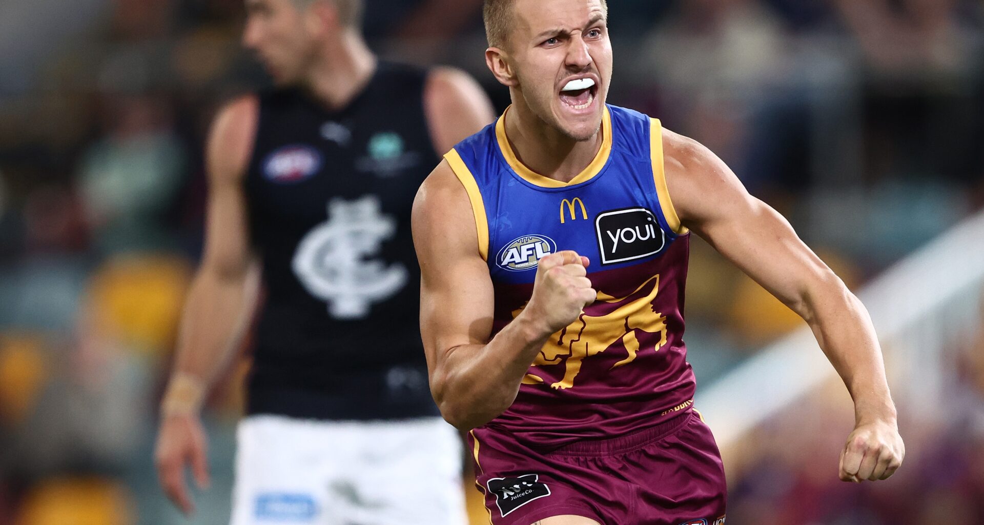 Roaring start saves Lions from brave Blues comeback