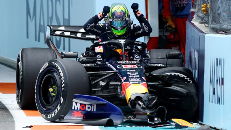 Isack Hadjar slams his fists on his Red Bull F1 car after crashing out of the 2026 Miami Grand Prix