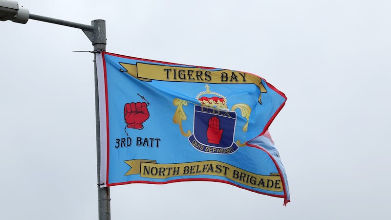 UDA and bonfire flags erected near contentious north Belfast pyre