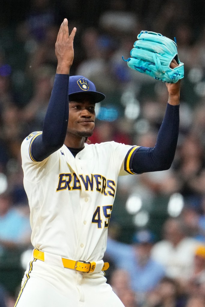 Milwaukee Brewers pitcher Abner Uribe (45) celebrates the final out of in the eighth inning against the St. Louis Cardinals at American Family Field.