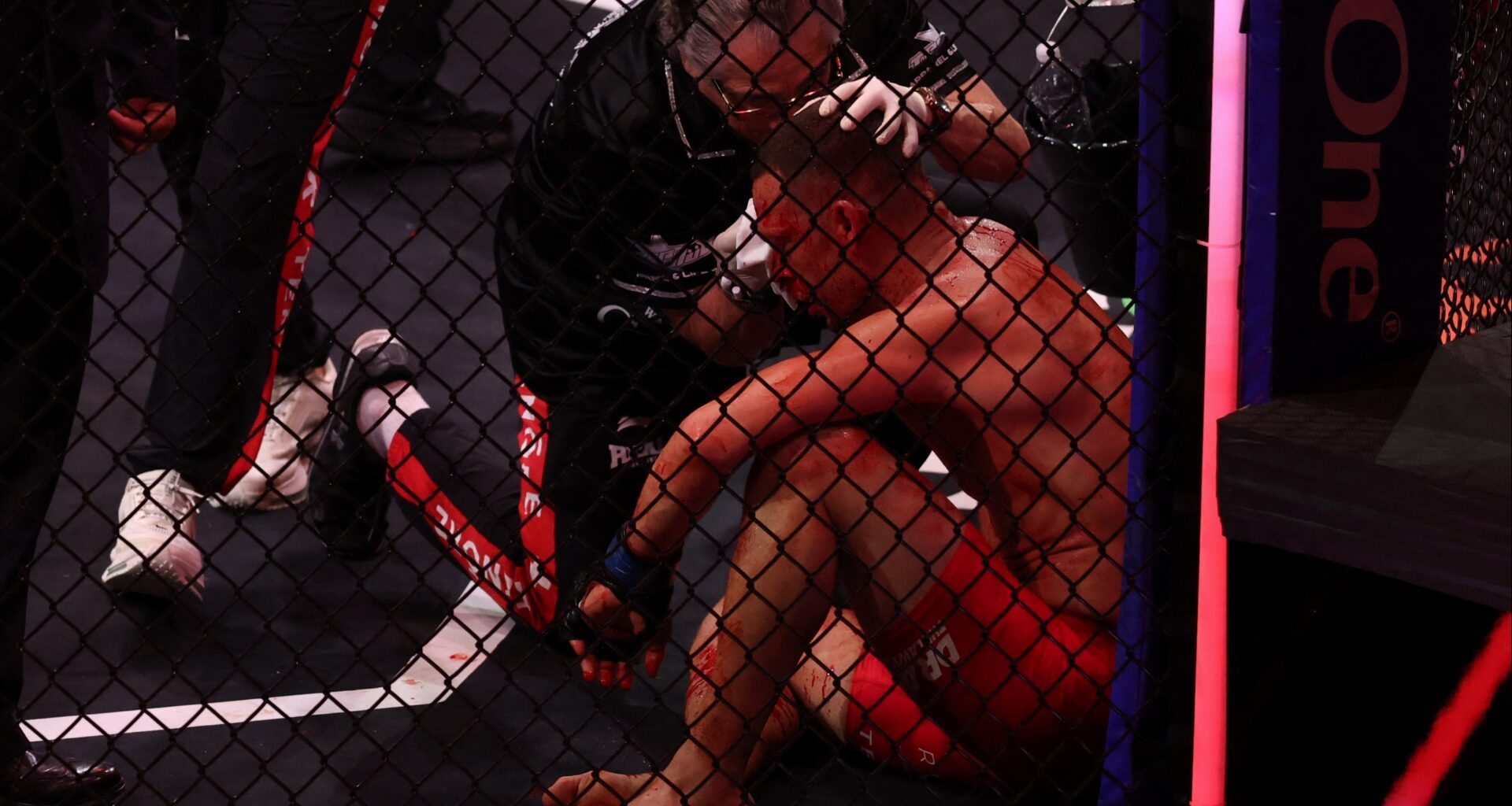Nate Diaz gets medical treatment in the cage