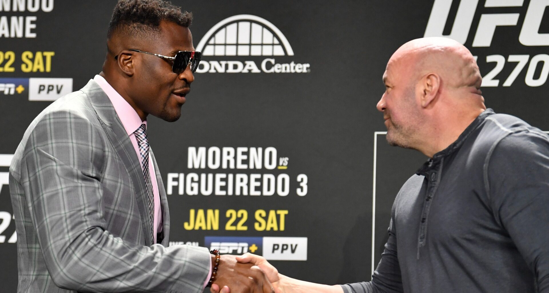 Dana White and Francis Ngannou exchange greetings at the UFC 270 press conference