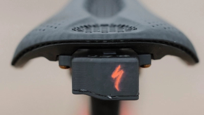 A telemetry box sits beneath a saddle