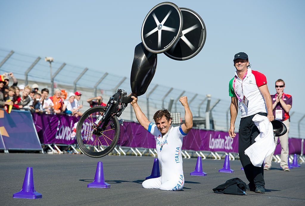 Italy&amp;apos;s Alessandro Zanardi celebrates after winning the gold medal in the men&amp;apos;s individual H4 time trial cycling final during the London 2012 Paralympic Games at Brands Hatch circuit, in Kent, southern England on September 5, 2012. AFP PHOTO / LEON NEAL (Photo credit should read LEON NEAL/AFP/GettyImages)