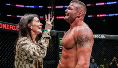 Anatoly Malykhin celebrates with his wife, Anita, after becoming a three-division MMA World Champion.