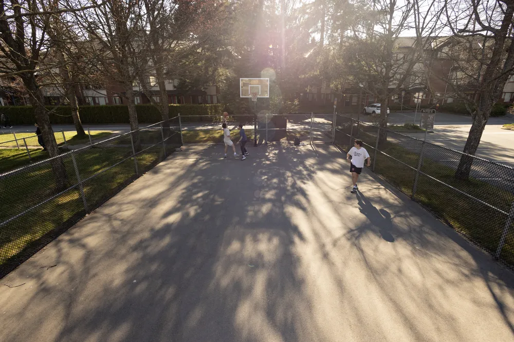 A group playing a pickup game at Fairview Crescent.
