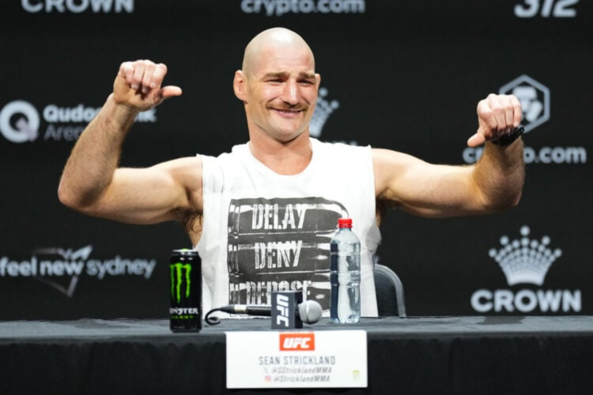 Sean Strickland entertains fans during UFC 312 presser