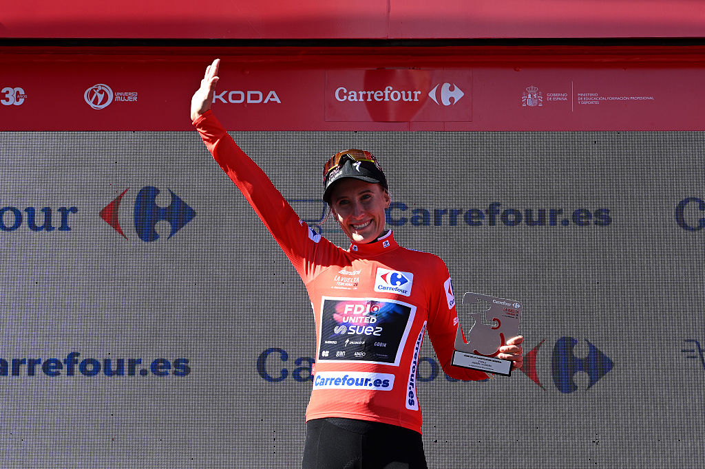 A CORUNA, SPAIN - MAY 05: Franziska Koch of Germany and Team FDJ United - SUEZ celebrates at podium as Red Leader Jersey winner during the 12th La Vuelta Femenina 2026, Stage 3 a 121.2km stage from Padron to A Coruna / #UCIWWT / on May 05, 2026 in A Coruna, Spain. (Photo by Szymon Gruchalski/Getty Images)