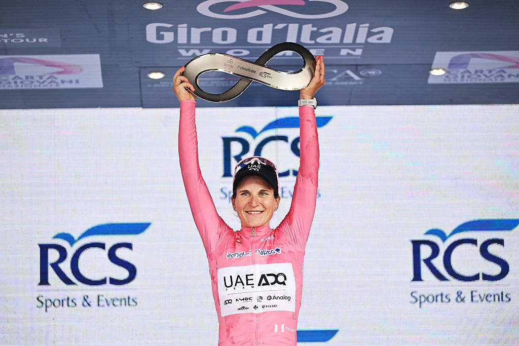 IMOLA, ITALY - JULY 13: Elisa Longo Borghini of Italy and UAE Team ADQ - Pink Leader Jersey celebrates at podium as overall final race winner during the 36th Giro d&amp;apos;Italia Women 2025, Stage 8 a 134km stage from Forli to Imola / #UCIWWT / on July 13, 2025 in Imola, Italy. (Photo by Luc Claessen/Getty Images)