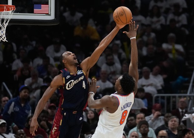 Cavaliers center Evan Mobley blocks a shot by Knicks forward Og Anunoby on May 24. (Sue Ogrocki - The Associated Press)
