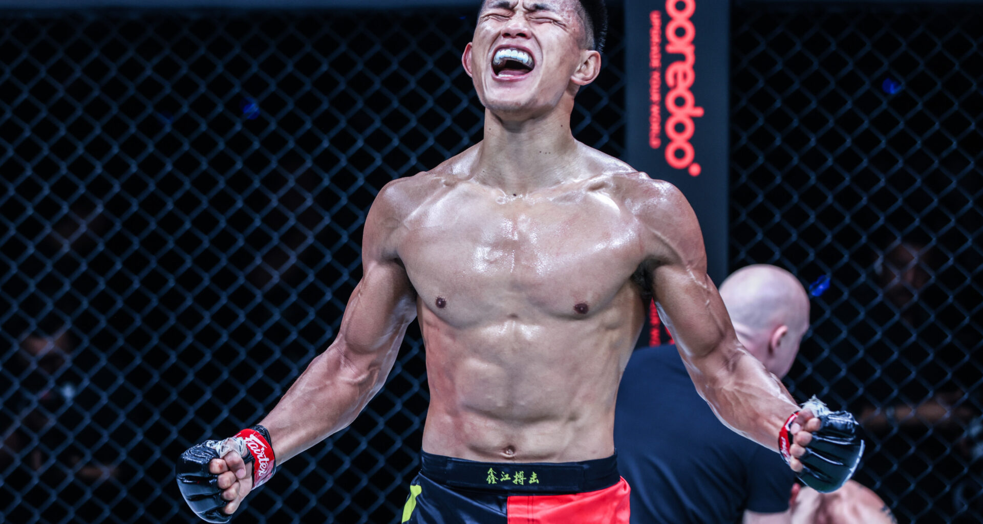 Tang Kai celebrates after beating Thanh Le at ONE 166