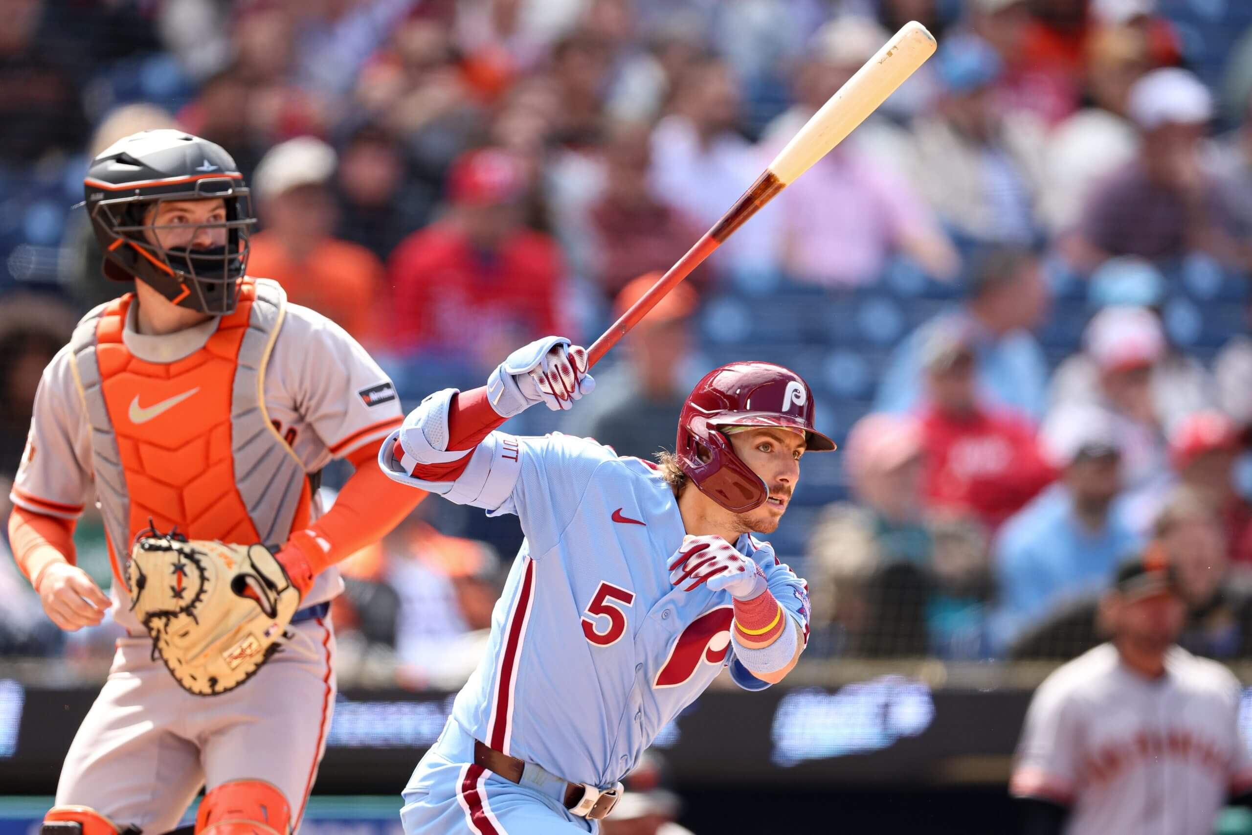 Philadelphia Phillies second baseman Bryson Stott follows through on a swing.