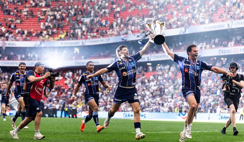 Union Bordeaux Bègles' Matthieu Jalibert and Damian Penaud celebrate with the Champions Cup trophy. Photograph: James Crombie/Inpho