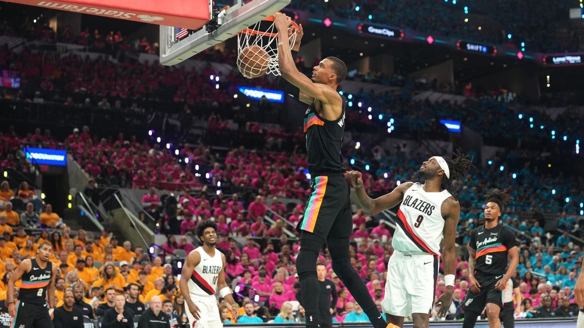 San Antonio Spurs big Victor Wembanyama jams it against the Portland Trail Blazers during Game 1 of the first round of the 2026 NBA Playoffs at Frost Bank Center in Texas.