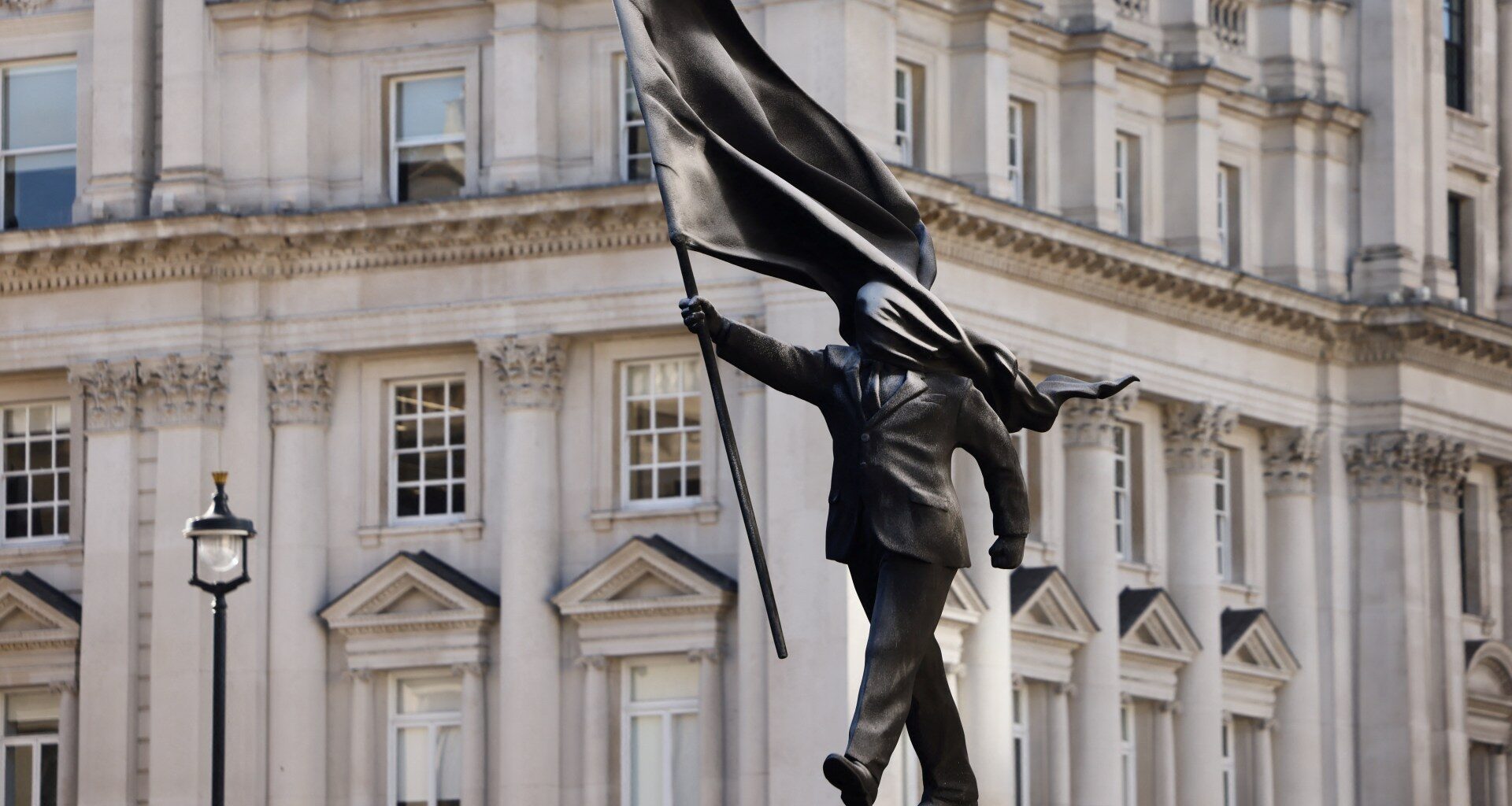 New Banksy sculpture appears to show politician blinded by his own flag | Arts and Culture