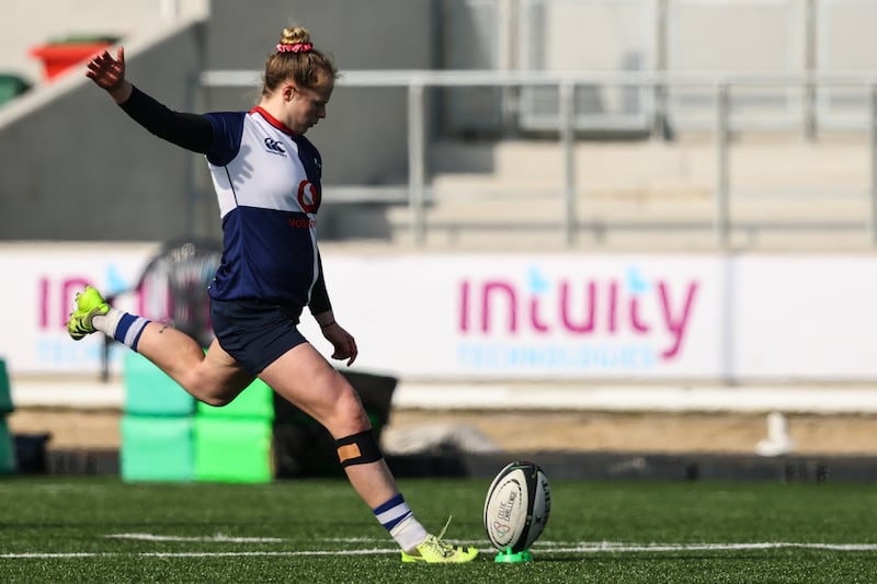 Dannah O'Brien uses a pronged tee with the ball low to the ground. Photograph: Ben Brady/Inpho