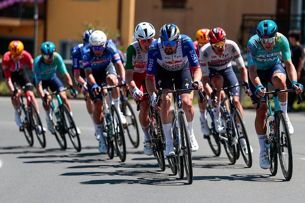 Red Bull - BORA - hansgrohe German rider Nico Denz (C) rides in a breakaway during the 11th stage of the Giro d'Italia 2026 - Tour of Italy cycling race between Porcari and Chiavari, Italy, on May 20, 2026. (Photo by Luca Bettini / AFP)