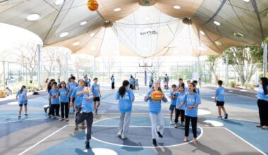 Renovating Israeli basketball courts, ballplayer Jared Armstrong offers respite to war-weary kids