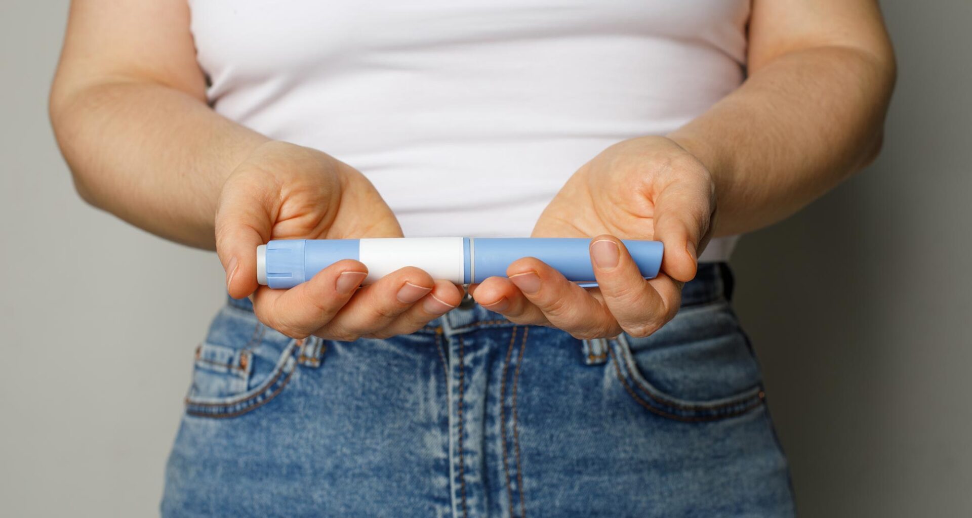 Woman Holding Semaglutide Ozemic Diabetes Weight Loss Pen