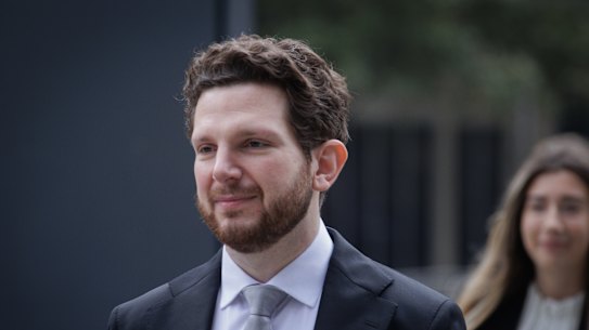 Pianist Jayson Gillham arrives at the Federal Court today.