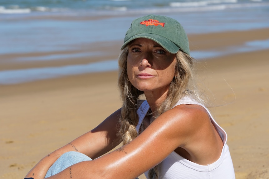 portraits of woman on a beach.
