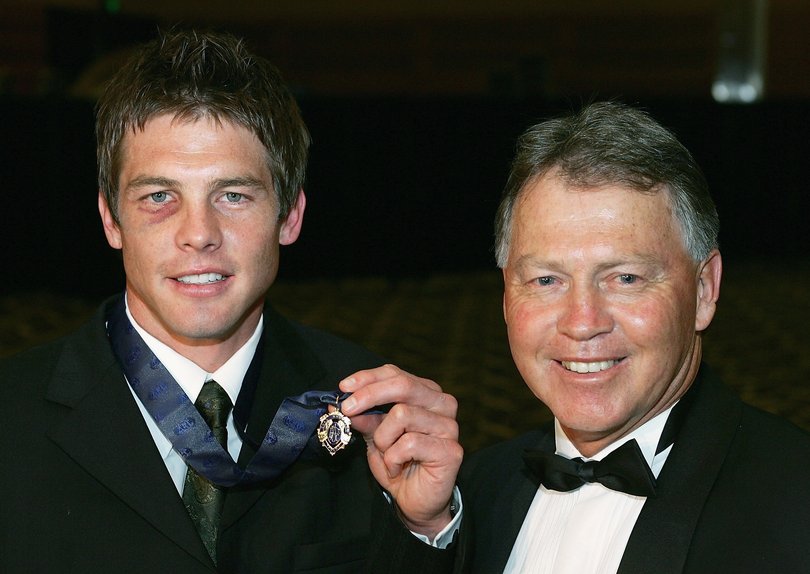 Ben Cousins poses with his father Bryan Cousins after winning the 2005 Brownlow Medal at Burswood Resort Grand Ballroom September 19, 2005 in Perth.