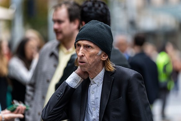 Reg Mombassa from Mental as Anything arrives.