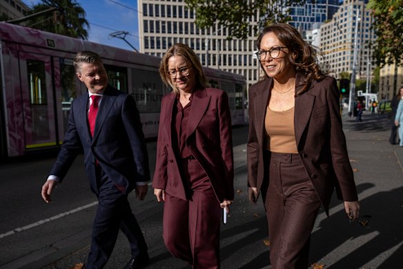 Premier Jacinta Allan, Treasurer Jaclyn Symes and Deputy Premier Ben Carroll arrive at Parliament on Tuesday. 