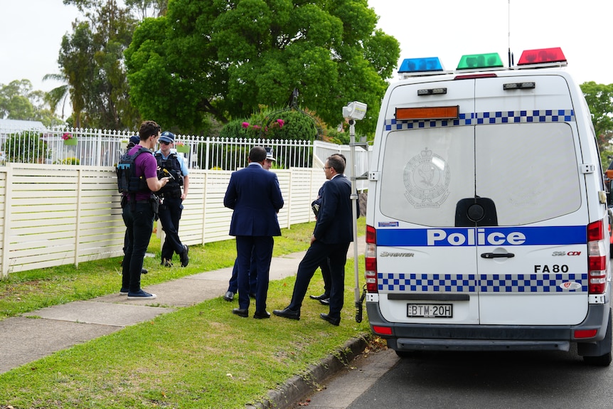Police gathered in suburban Bonnyrigg