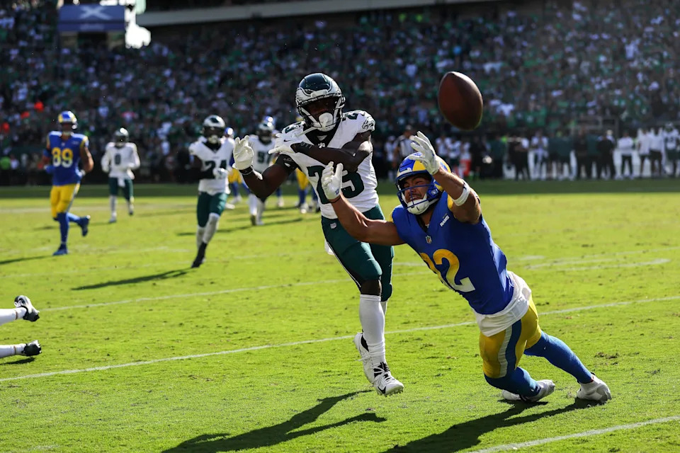 PHILADELPHIA, PENNSYLVANIA - SEPTEMBER 21: Puka Nacua #12 of the Los Angeles Rams attempts to catch the ball against Jakorian Bennett #23 of the Philadelphia Eagles during the game at Lincoln Financial Field on September 21, 2025 in Philadelphia, Pennsylvania. (Photo by Ishika Samant/Getty Images)