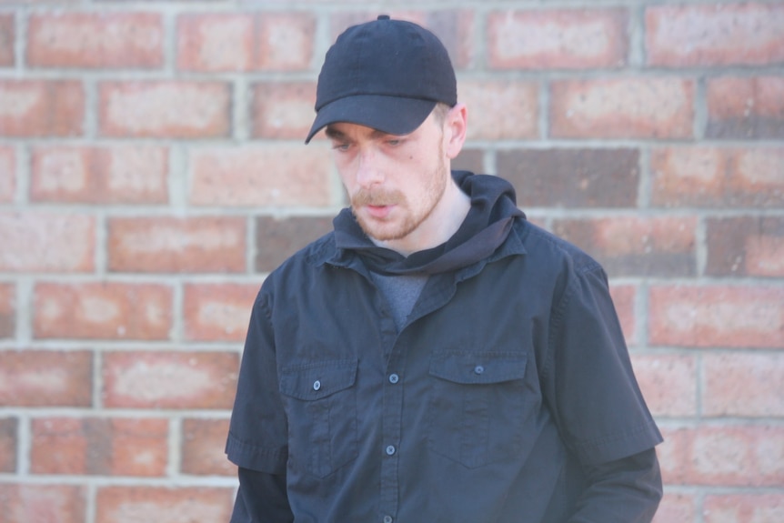 Nathan Dekkers leaves Busselton Courthouse after his sentencing for animal abuse was pushed back until October.