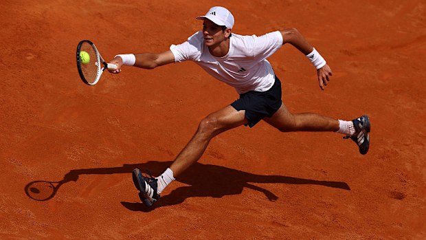 Rafael Jodar of Spain plays a forehand against Learner Tien of United States.