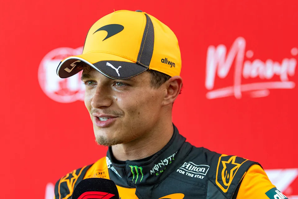 Lando Norris talks to the media.