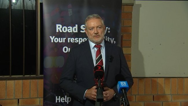 Detective Inspector Craig Mansfield addresses media following the alleged armed robbery targeting an Armaguard vehicle at Eli Waters Shopping Centre.