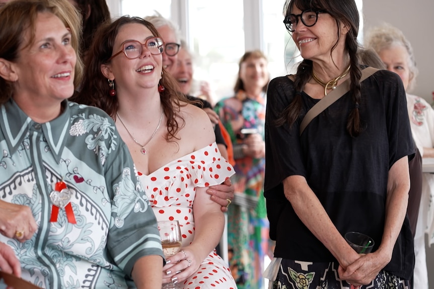 Three smiling women.